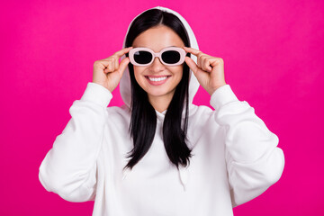 Photo of charming positive lady shiny smile wear sunglass white sweatshirt isolated pink color background