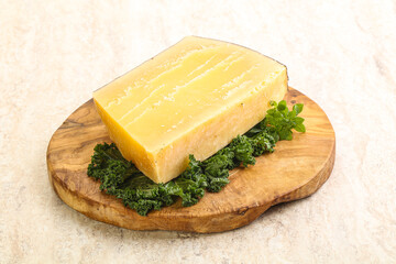 Parmesan cheese piece over board