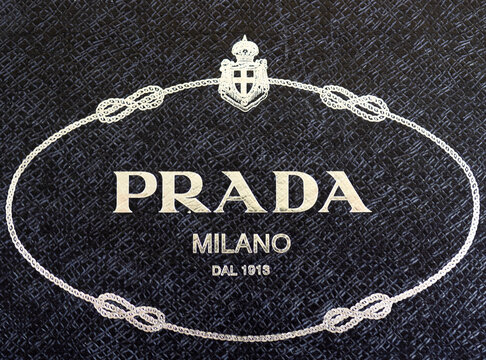 Logo Prada on black background.Prada is a fashion house founded in 1913 in Milan, Italy