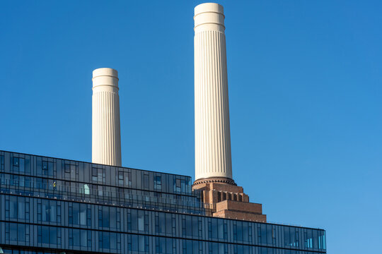 Chimneys of Battersea Power station against blue sky, London, UK