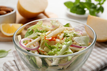 Delicious turnip salad served on table, closeup