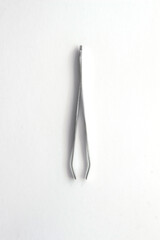 manicure tweezers isolated on white background. High quality photo