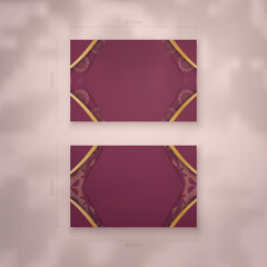 Business card template burgundy with abstract gold ornaments for your brand.