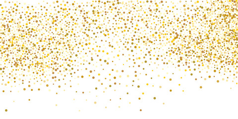 Gold small confetti on a white background. Luxurious festive Christmas background. Gold glittering abstract texture..