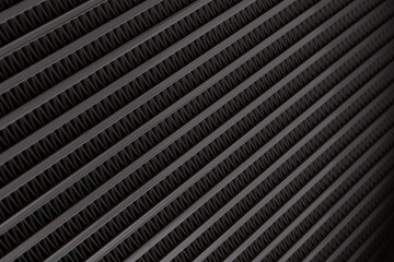 Abstract and textured Metal lines in car radiator macro close up view