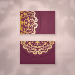 Business card template burgundy with vintage gold pattern for your business.