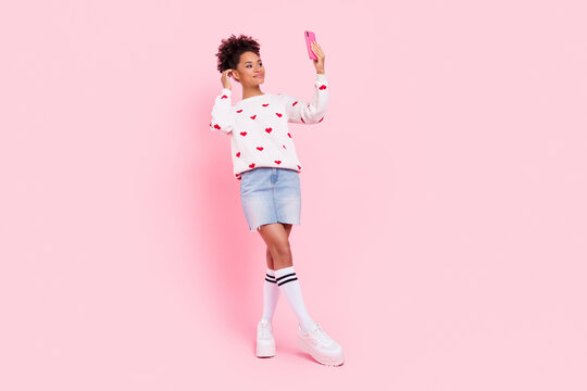 Full body photo of youth charming lady make selfie video recording vlogging smartphone isolated over pink color background