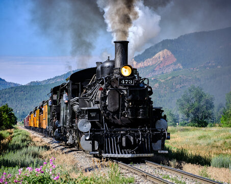 The narrow gauge railroad locomotive under power between Durango and Silverton in Colorado