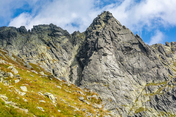 The beautiful solid wall of the Wolowa Turnia (Volia veza) peak with the climbing classics of the Slovak Tatras.