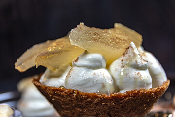 Wafer dessert, with vanilla mousse and caramel fruit