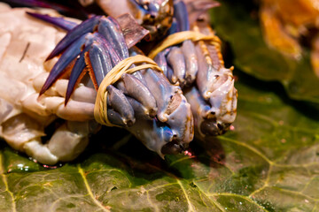 Fish store in the boqueria of Barcelona, blue crab (Callinectes sapidus), selective approach.