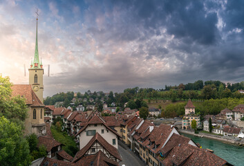 Travel to Bern. Sunrise photographed in this beautiful city from Switzerland. Photo taken next to Aare river with view to the entire old part of the town.