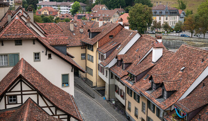 Fototapeta na wymiar Bern, Switzerland - 2021: Traveling on the streets of this amazing Swiss city, next to its main landmarks. Great architecture and beautiful sights.