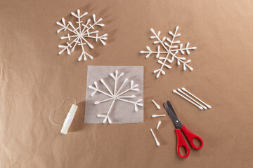 cotton swab snowflake handmade craft for kids, Christmas activity for preschooler,  - obrazy, fototapety, plakaty