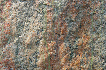 Granite stone texture. Cracked granite rock surface. Natural stone backdrop. Close-up