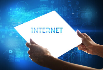 Hand holdig futuristic tablet , technology concept