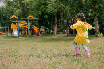 Obraz premium a girl of 4-5 years old shows different emotions. yellow clothes.