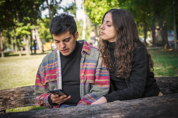 Couple using mobile smartphones. Emotional isolation and technology depression