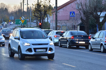 Traffic jam and high beam swinging lights when crossing a road work area. Car.