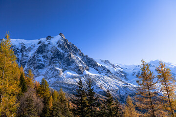 Obraz premium A mountain in the Mont Blanc massif in the Alps, the Aiguille de Midi. Elevation of around 3842 meters. It is a starting point for all sorts of extreme sports. October, 2021.