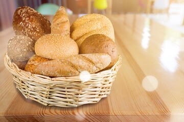 Various kinds of bread stuff. Bread rolls, baguette, sweet bun, croissant and bagel.