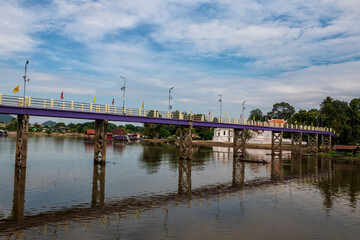 Fototapeta na wymiar boat through Sakae Krang bridge, Uthai Thani