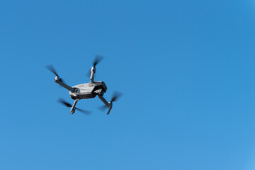 Drone isolated on blue sky background 