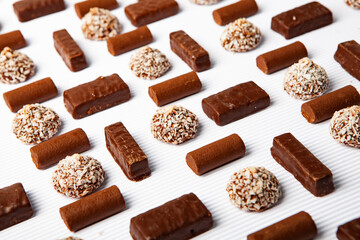 Assortment of delicious chocolate candies background. Chocolate candy isolated 