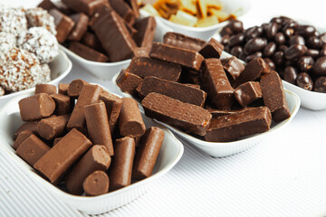 Assortment of delicious chocolate candies background. Chocolate candy isolated 