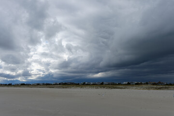 Threatening skies and empty east coast beach in early winter