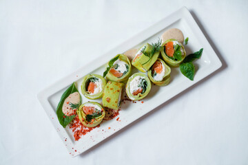 Rolls with cream cheese and salmon.