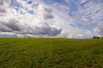 natural background summer season field clouds and horizon