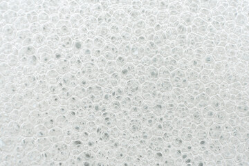 Soap bubbles background. Shampoo foam. Bubbles in the water