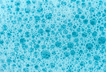 Soap bubbles background. Shampoo foam. Bubbles in the water