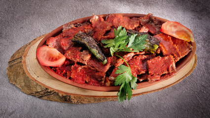 Traditional Turkish Doner Kebab also known iskender. Iskender kebab iskender kebap. Turkish style doner kebab food on wooden tray