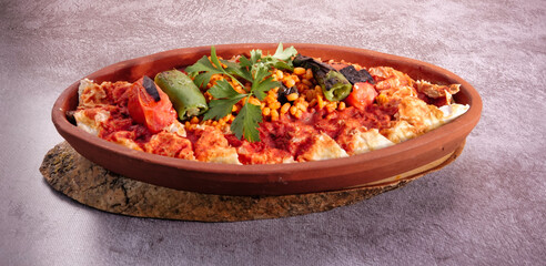 Turkish Beyti Kebap garnished with vegetables on a wooden tray - Turkish, Arabian Food Kebab