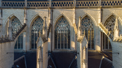 Windows and pillars of gothic cathedral during a sunny afternoon