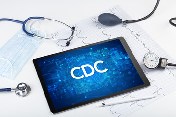 Close-up view of a tablet pc with medical abbreviation