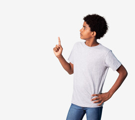 young afro latino student pointing and watching up isolated