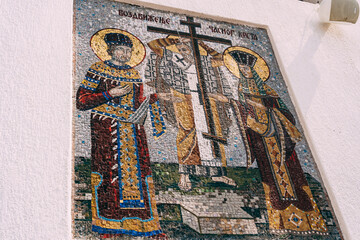 Mosaic of the raising up the cross of the lord on the wall of the Ostrog monastery. Montenegro