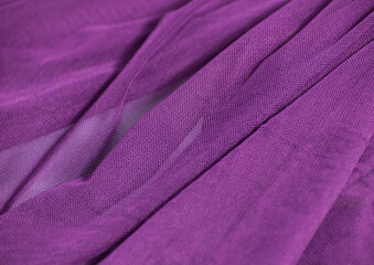 textured fabric mesh fuchsia close-up