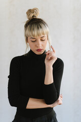 Fototapeta premium Portrait of young blond woman with red lips