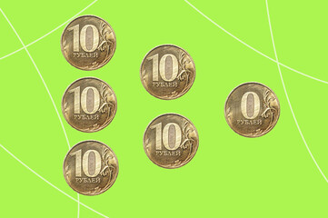 Six coins isolated on green background