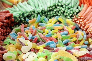 Sour and sweet gummy marmalade, colorful jelly candy. Chewing candies in a shop