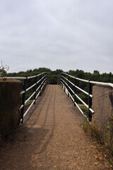 Humped old narrow pedestrian bridge