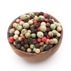 Pepper mix seed on spoon on white background.