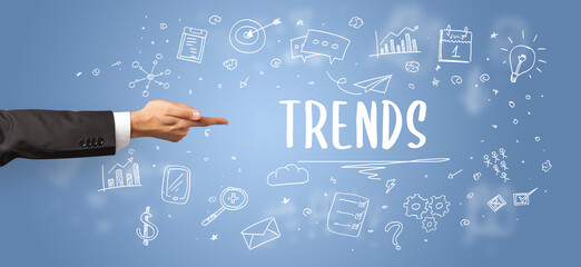 Close-Up of cropped hand pointing at business inscription