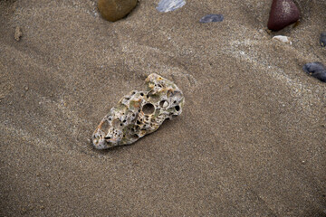 Beach pebbles, colourful rocks 
