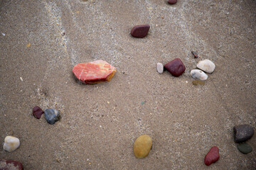 Beach pebbles, colourful rocks 