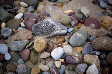 Beach pebbles, colourful rocks 